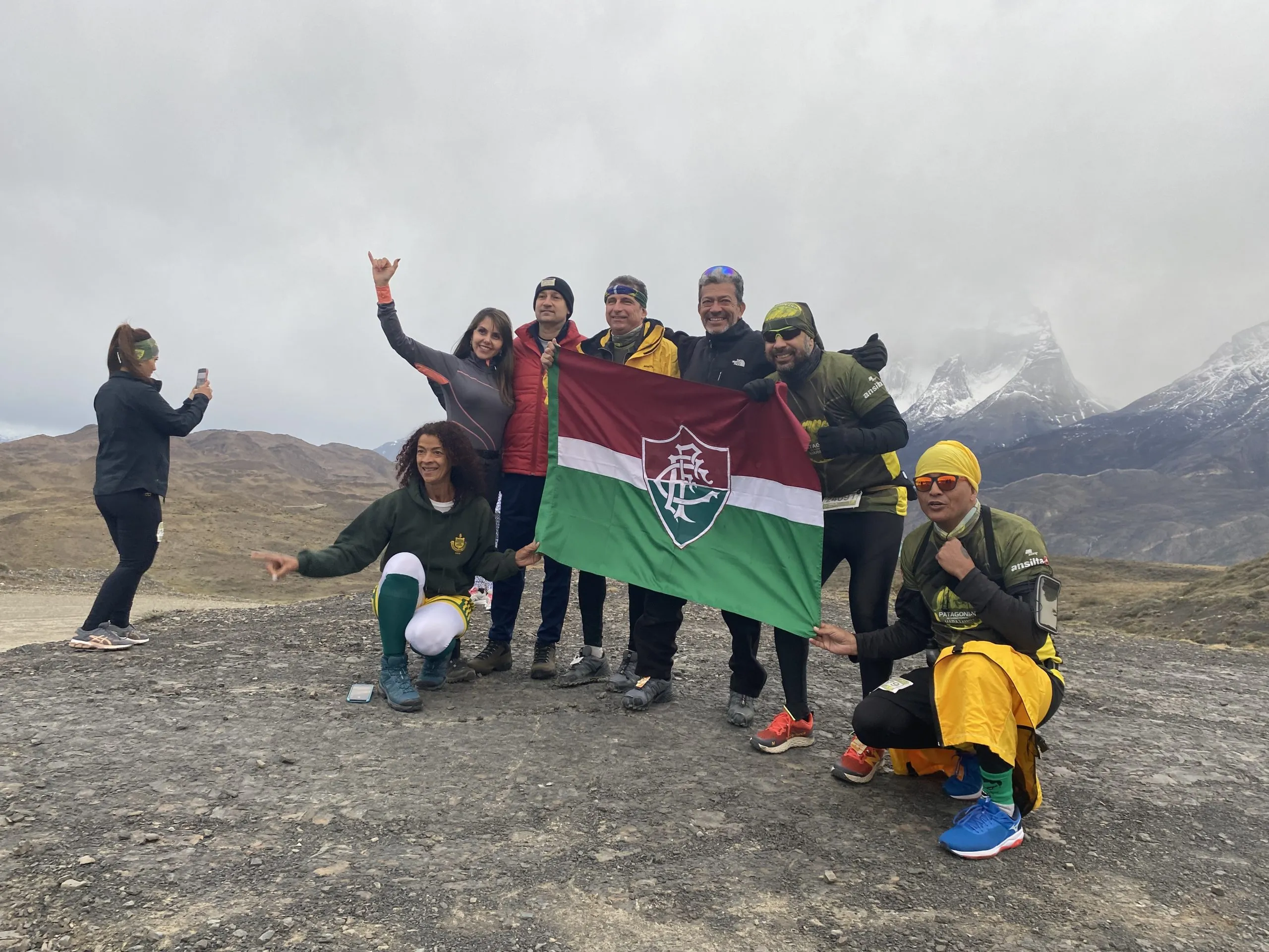 Travellers celebrating on reaching a viewpoint in the park